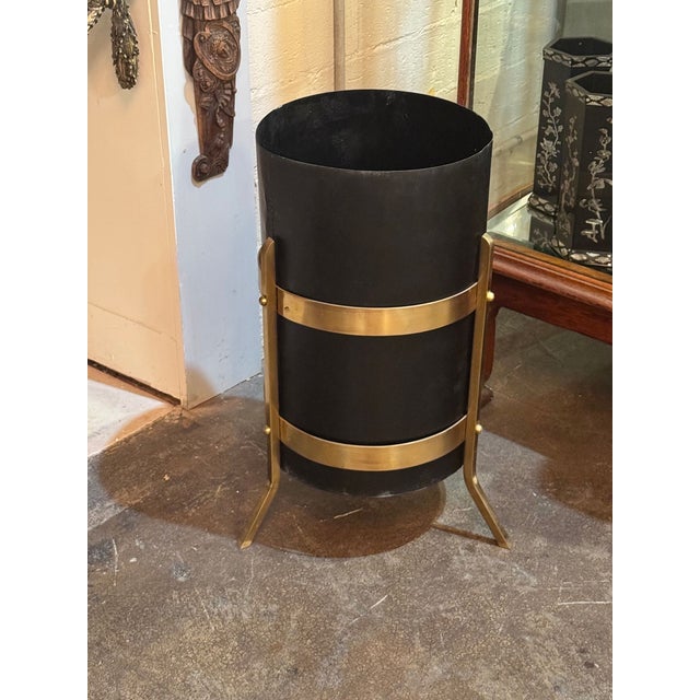 The Italian MCM Style Steel and Brass Umbrella Stand is a stylish and functional decorative accessory for any home. Made...