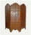 Ornate, Tudor Revival style brass repousse folding screen. Upper section consists of central panel with "Tudor Rose" motif...