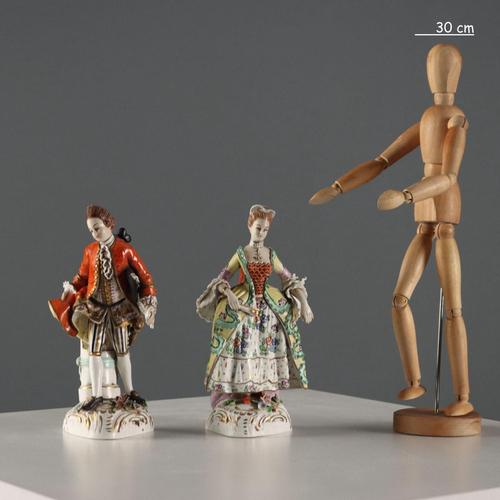 Pair of German polychrome porcelain figurines, 'Lady and Knight'. Carefully crafted robes and faces. Fine hand-decorated....