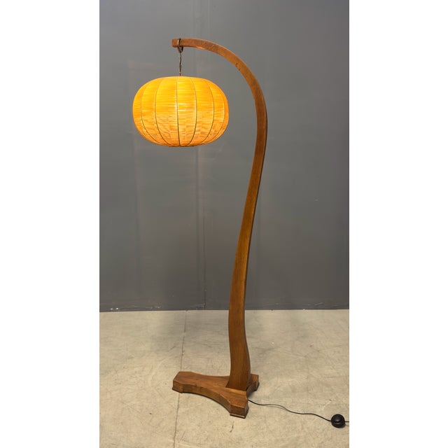 Oak floor lamp with woven silk shade. Italy, 1950s. European Plug (up to 250V).The wiring of this item may be original and...