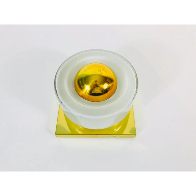 A beautiful pair of modern wall lamps by Glashütte Limburg made in Germany in the 1980s. They have a square shape and are...