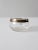This vintage glass cup, in the style of Dorothy Thorpe, features a softly bulbed bowl with a straight glass handle and a...