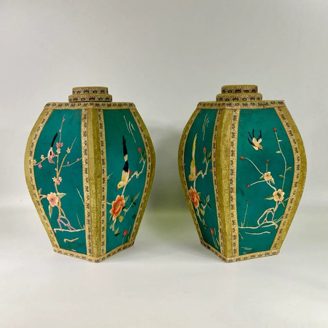 A beautifully embroidered set of lantern shaped containers with 4 sides that depict birds, butterflies and flowers. This...