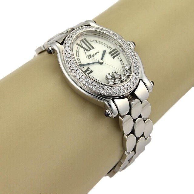 Authentic Happy Sport wrist watch from Chopard. This gorgeous piece features a stainless steel case and pebble style band...