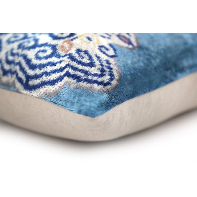 "Crafted from premium silk velvet handwoven in Turkey and Uzbekistan Unique blue tiger design with ivory and navy patterns...