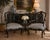 Elegant pair of 1990s William Switzer accent armchairs featuring sculptural loop back splats, graceful cabriole legs, and...