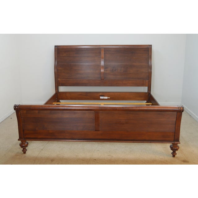 King Bed by Ethan Allen. Store item # 578. It features solid wood construction and reeded headboard.
