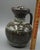 A visually commanding hand-thrown studio stoneware pitcher/ewer, approximately 8" tall, representing the highest level of...