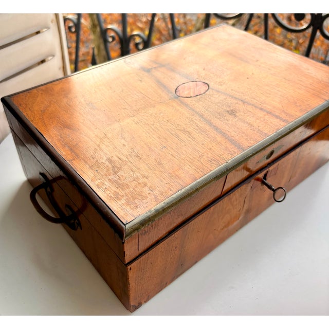 A large antique wooden box from the Napoleon III period, crafted in the mid of the 19th century, offering both functional...