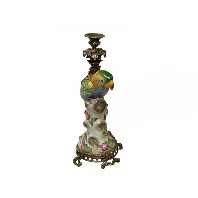 This vibrant Parrot Candle Holder is a whimsical and elegant addition to any home decor. Hand-painted with intricate...