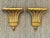 These are a handsome pair of vintage Hollywood Regency-style gilt wall brackets (wall shelves) with a dramatic...