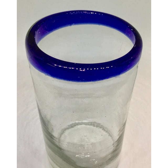 Lovely heavy stable vase with true cobalt rim. This antique vase is a classic. Just wait and see how gorgeous your flower...