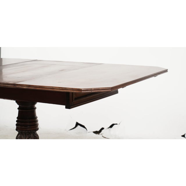 An English Regency-Style Drop-Leaf Table 20th century; with a drawer to each end Dimensions: Open: 28 1/4 x 53 x 36 in....