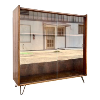 Lane Book Shelf Display With Glass Sliding Doors and Hairpin Legs For Sale