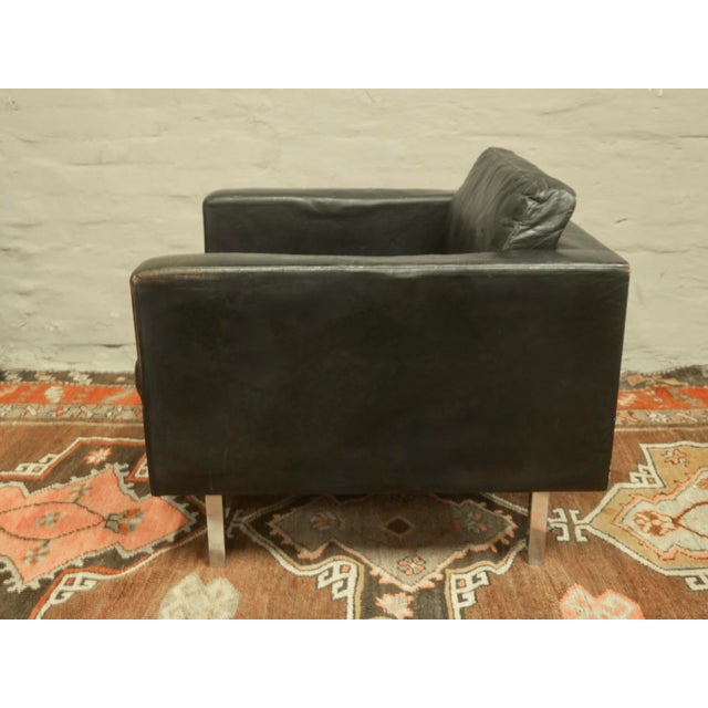 Early leather lounge chair by Cor dating back to the 1950s, elegant minimalist design. COR label underneath. This piece...