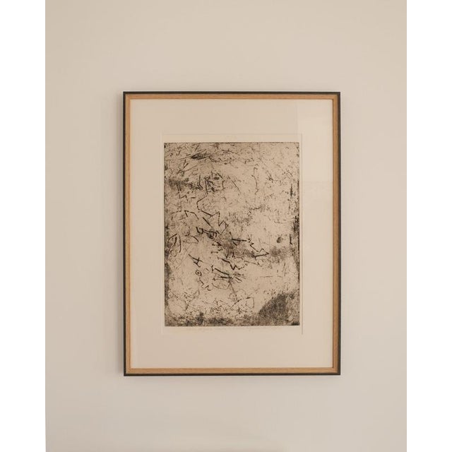 In this intaglio print, Jean-Pierre Jouffroy employs a gestural visual language of broad lines and bold strokes to create...