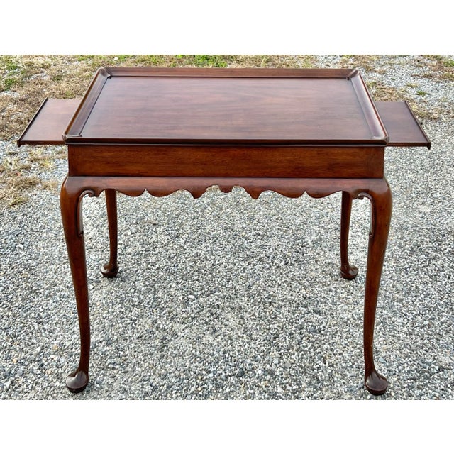 Classic Queen Anne style mahogany tea table from the colonial Williamsburg collection by Kittinger furniture of Buffalo...