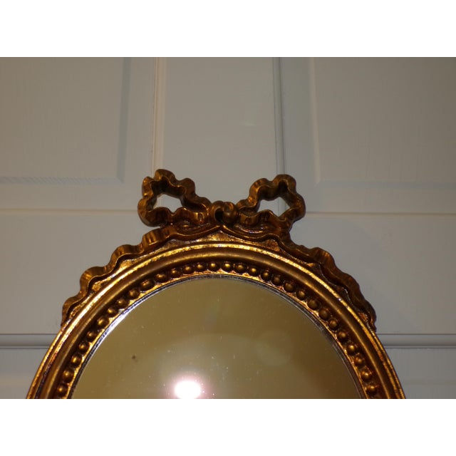 1970s Vintage Italian Florentine Gilded Oval Mirror Ribbon Bow Accent Italy For Sale - Image 5 of 13