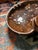 Large speckled round kidney bean shaped tray also suitable as a catchall or trinket dish. Hollow base. 1977 Small chips...