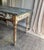 Gorgeous wood table from France, circa early 1900s. Beautiful patina and solid construction. Can be used as a dining...