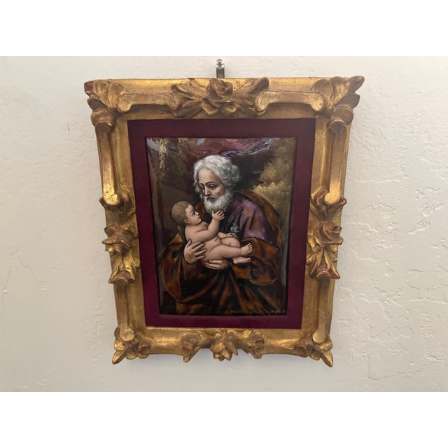 This is a hand painted museum quality reproduction of "St Joseph with the Infant Jesus c. 1635" by Guido Reni. I believe...