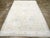 A Vintage Indian Cotton Agra Carpet handmade during the Mid-20th century. Measures: 7' 10" x 12' 8"