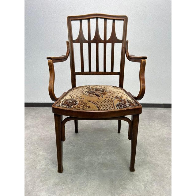 A rare and highly collectible example of Vienna Secessionist furniture design. This elegant armchair, Model No. 327, was...