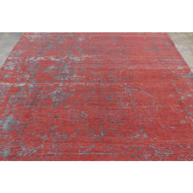 Hand-knotted in wool, this 8x11 transitional rug joins Rug & Kilim’s Modern collection. It offers a sophisticated, avant-...