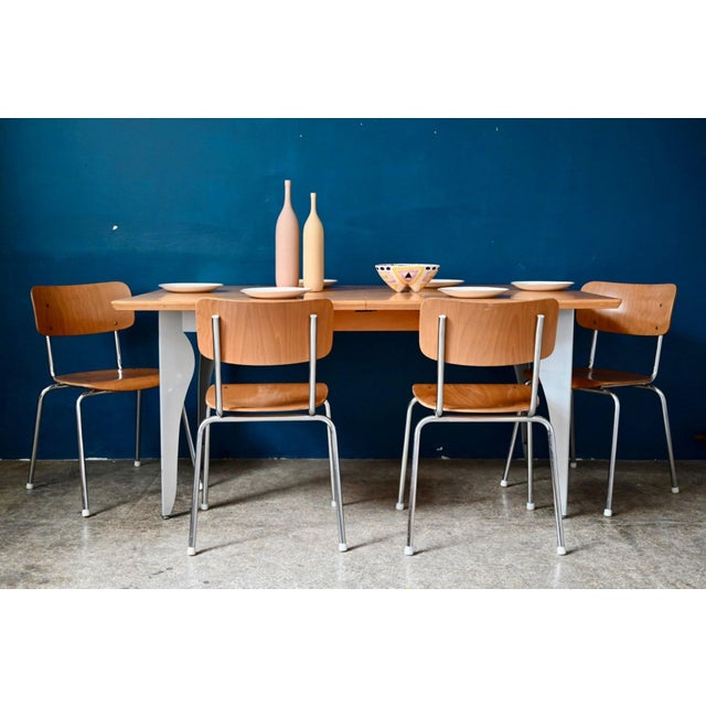 Both elegant and inviting, this large extendable table embodies the spirit of 1990s design, when creators loved to play...