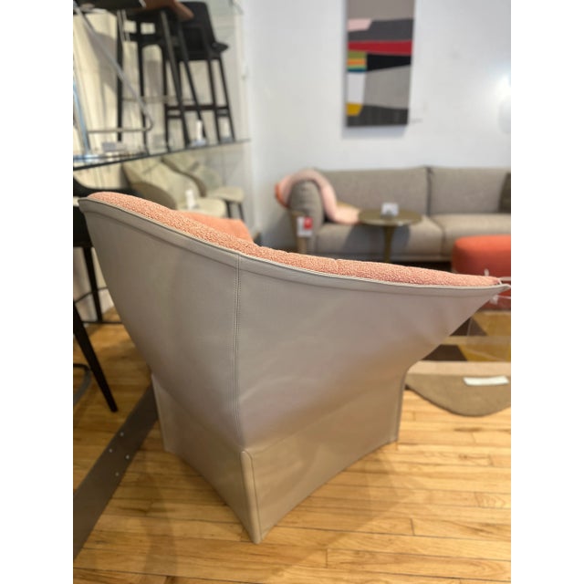 This high back, two-tone lounge chair is designed by Inga Sempé for Ligne Roset. With the exception of the thermoformed...