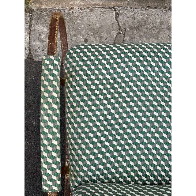 Rare vintage rocking chair by Guido Faleschini, an iconic Italian design, with a gold-plated metal frame and original...