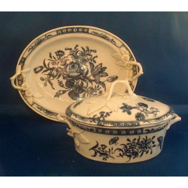 A good Worcester Dr. Wall tureen or chestnut basket decorated with flowers and birds in a Chinese garden with applied...