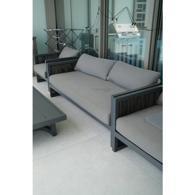 A complete 4-piece outdoor seating arrangement from Restoration Hardware's. Originally specified for a luxury oceanfront...