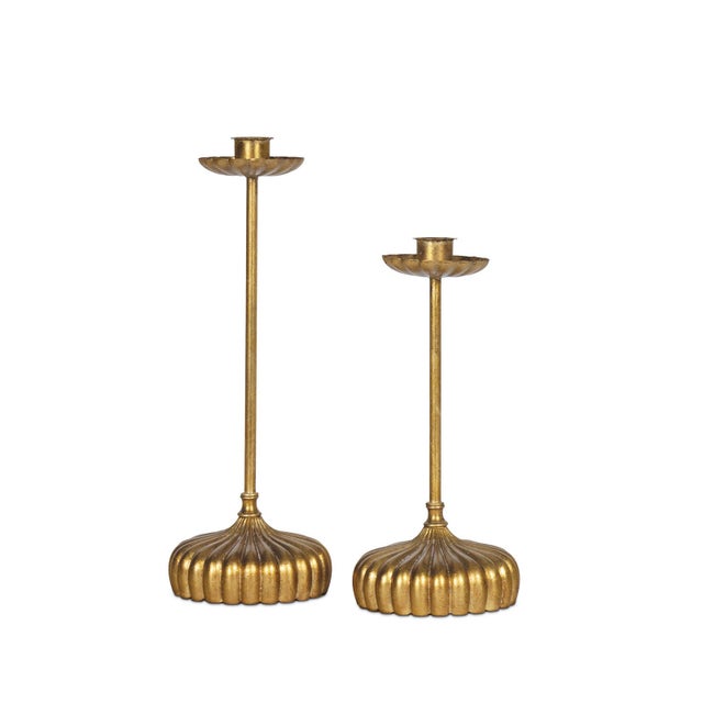 Introduce classic elegance to your home with the Clove Candle Holder Set. Each holder boasts antique-style candle cups...