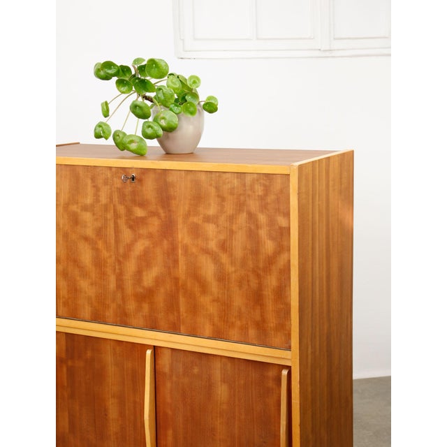 Restored bar cabinet from the 50s. depth is 40cm plus handles that measure 3cm, so 43cm altogether.