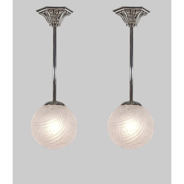 HETTIER & VINCENT and Verreries des Hanots A pair of 1925-1935 French art deco pendant lights by Hettier & Vincent in...