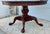 Vintage (1990's) Round Dining Table (no name found) with a Pedestal Base. Made of Wood. Carved Mahogany with Banded Inlay....