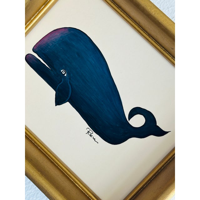 Hand-painted entirely by hand by our master artists, this whimsical whale features a rich black body with subtle deep blue...