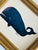 Hand-painted entirely by hand by our master artists, this whimsical whale features a rich black body with subtle deep blue...