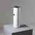 Floor-standing ashtray made from a painted metal frame, illuminated by a Nile green glass top. Patina due to age and use,...