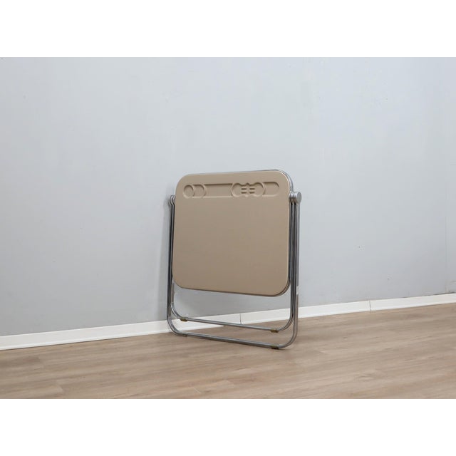 Authenticity has a specific aesthetic. This original 1970s platone table, designed by giancarlo piretti for anonima...