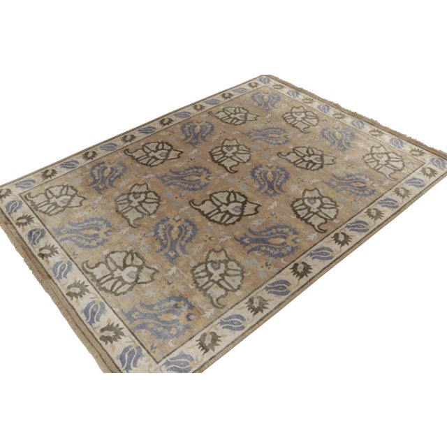 From Rug & Kilim’s Modern Classics selections, a 9x12 hand-knotted silk rug with an inventive adaptation of history...