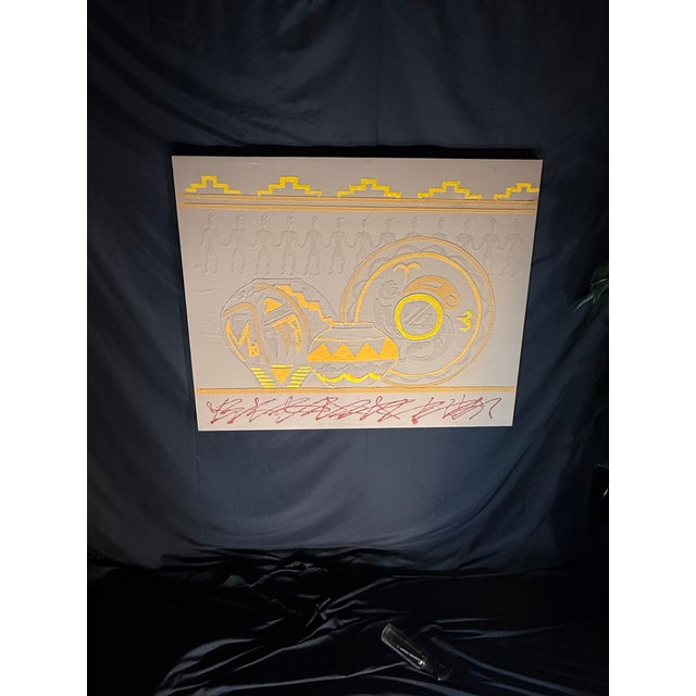 Large Southwestern style textured canvas wall art featuring a tan background with yellow, gold, taupe, and red accents....