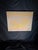 Large Southwestern style textured canvas wall art featuring a tan background with yellow, gold, taupe, and red accents....