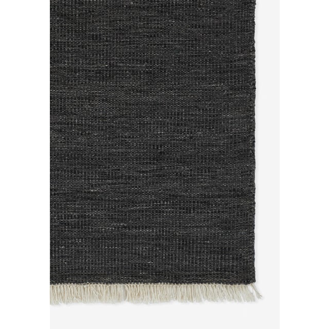 This charcoal toned rug from the Cove collection brings you minimalistic style for both the interior of your home as well...