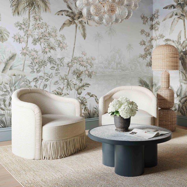 Introducing the Pamela Tassel Lounge Chair, a grandmillennial dream come true, available in luxurious Cream Boucle or...