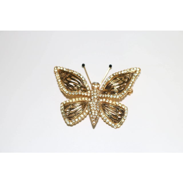 This is part of Chairish’s Costume Jewelry assortment. A lovely Gold Plate butterfly with diamante embellished wings and...
