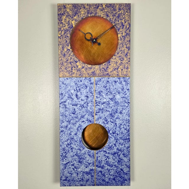 Handsome clock designed and signed by Leonie Lacouette, dated 2021. Large scale with copper face and pendulum. Looks...