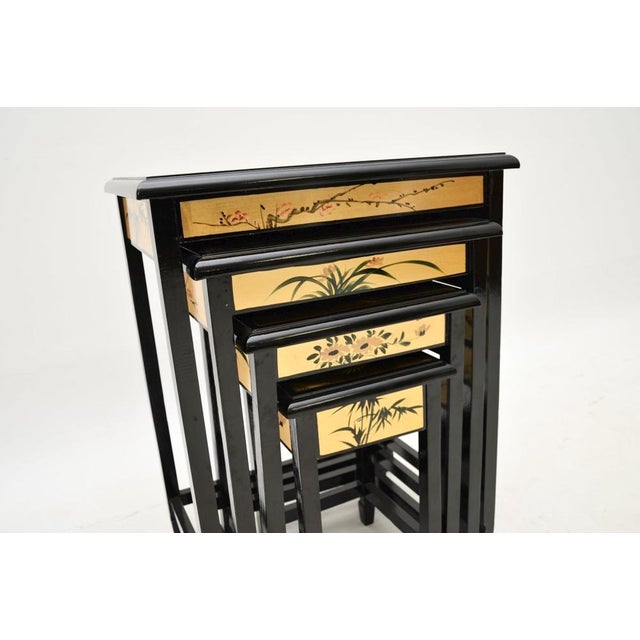 A beautiful and very well made antique Chinese style lacquered chinoiserie nest of tables. They were most likely made in...