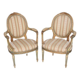 Pair of 19th C. French Louis XVI Paint Decorated & Gilt Carved Armchairs For Sale